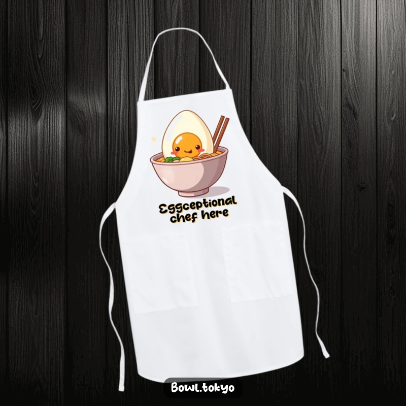 Funny Apron: A kawaii ramen bowl character with a giant, smiling egg peeking out, bringing cuteness to the kitchen.