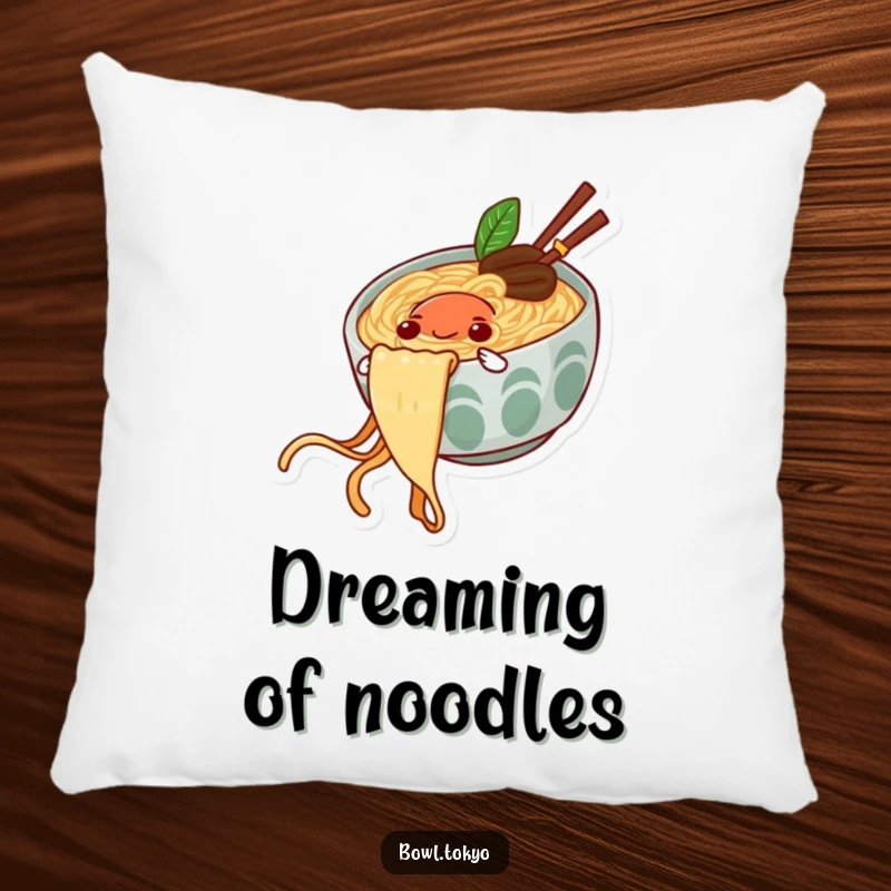 Funny pillow with a happy ramen bowl character enjoying a slide down a noodle string, perfect for relaxation.