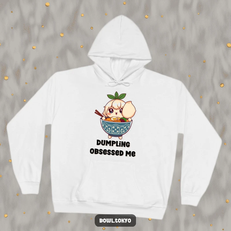 Funny hoodie featuring a ramen bowl character with shining eyes, holding a massive dumpling, ideal for cozy, humorous wear.
