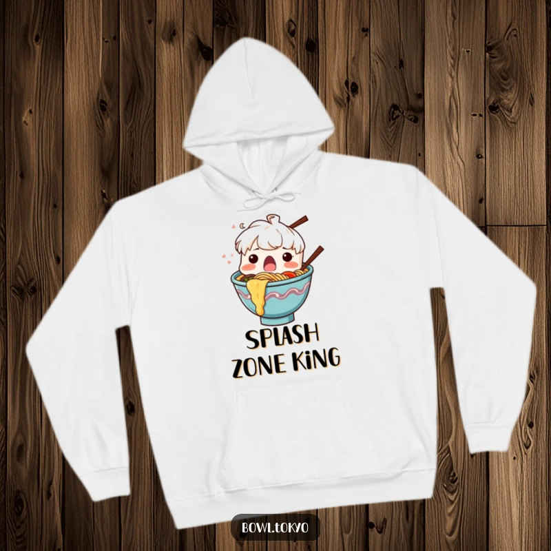 Funny Ramen Bowl Hoodie, a surprised character with noodles splashing out, perfect for cozy humor.