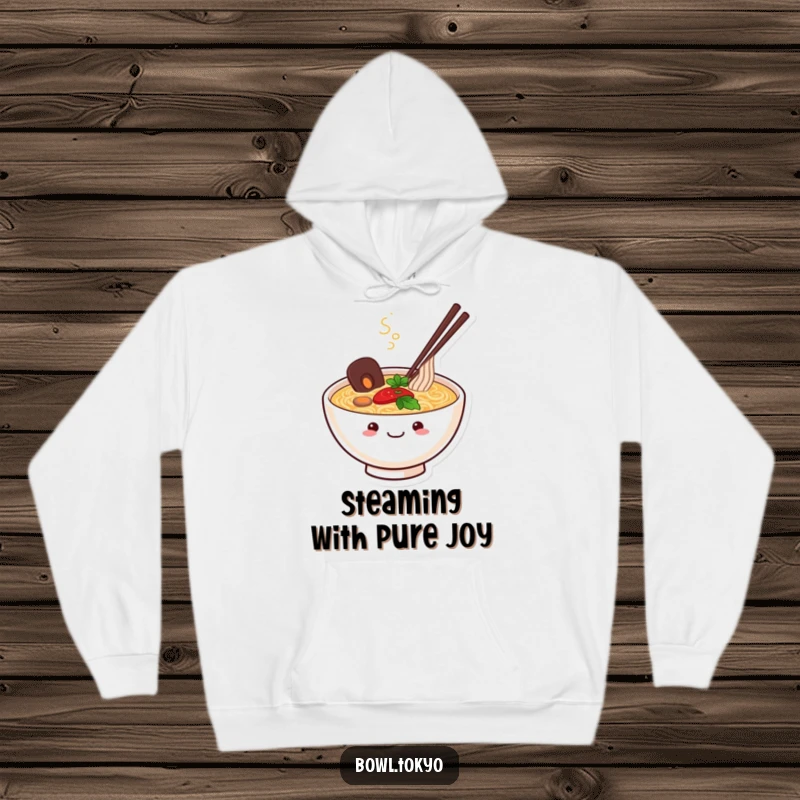 Funny Ramen Bowl Hoodie depicting a happy, smiling character with steam gently rising, offering cozy contentment and a touch of humor.