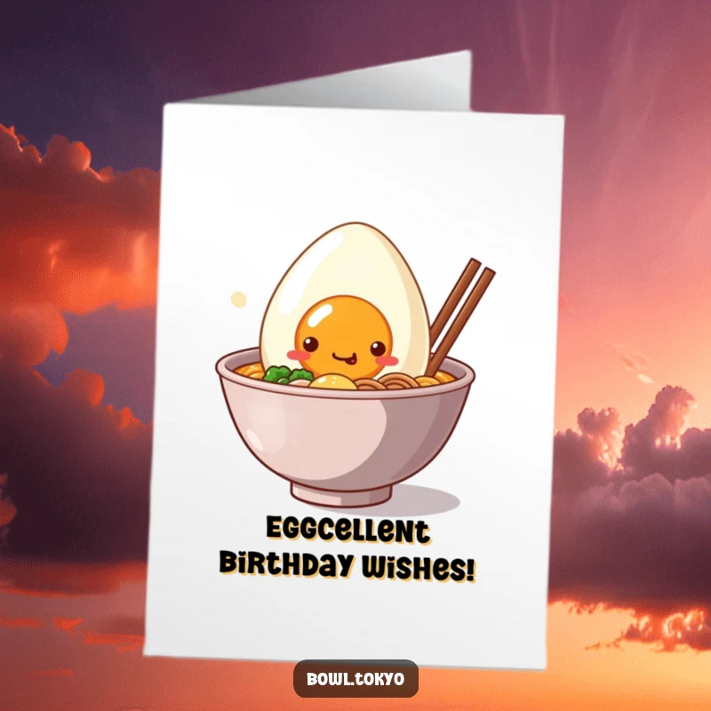 Funny free printable birthday card showing a Kawaii ramen bowl character with a giant, cheerful smiling egg peeking out adorably.