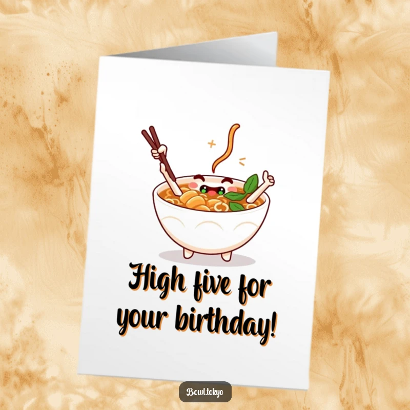 Funny free printable birthday card of a ramen bowl character with chopstick arms giving a playful, energetic high-five.
