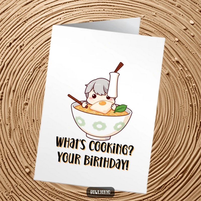 Funny Free Printable ramen bowl card, curiously inspecting kamaboko, perfect for a birthday, humorous downloadable greeting.