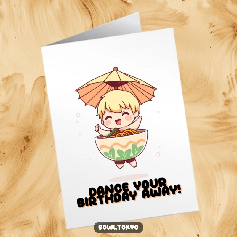 Funny Free Printable Birthday Card: Lively ramen character with a paper umbrella dancing joyfully in a soft mist!