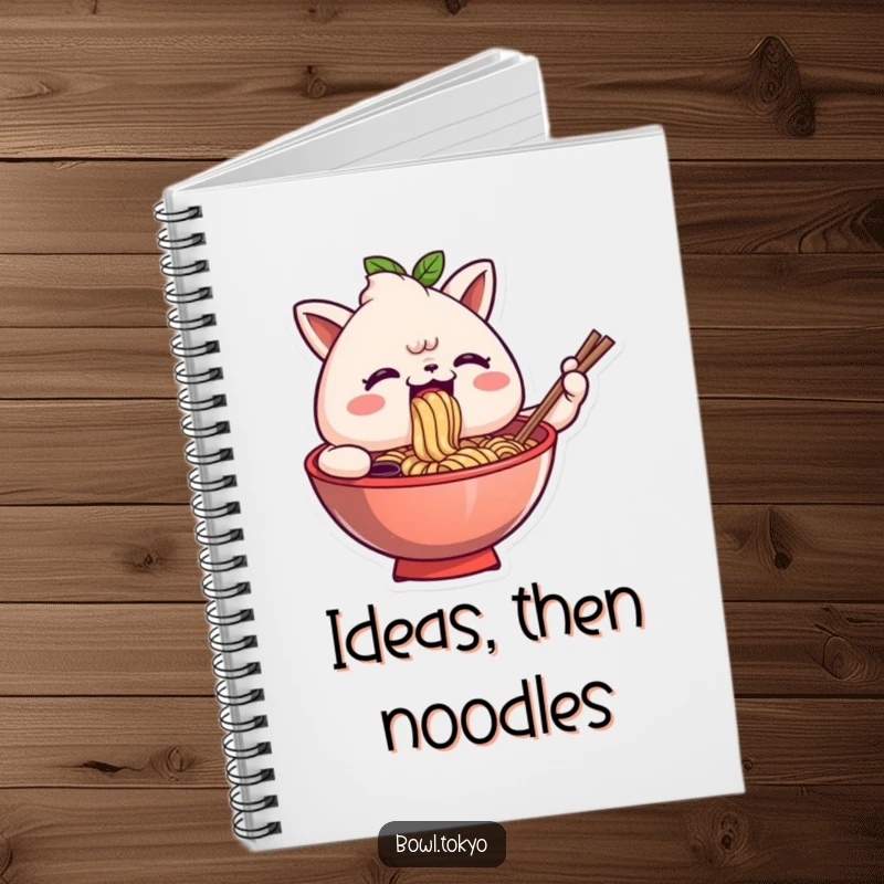 Funny notebook cover with an anthropomorphic ramen bowl character comically slurping noodles with a look of inspired creativity and satisfaction.