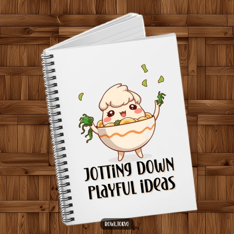 Funny Journal Ramen Bowl Notebook featuring a playful character juggling tiny seaweed pieces, perfect for capturing whimsical thoughts.