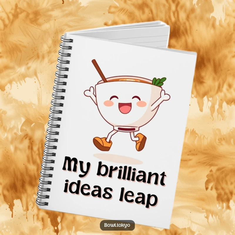 Funny ramen bowl in wooden clogs, mid-leap with noodles, a lined notebook for jotting down funny thoughts and ideas.