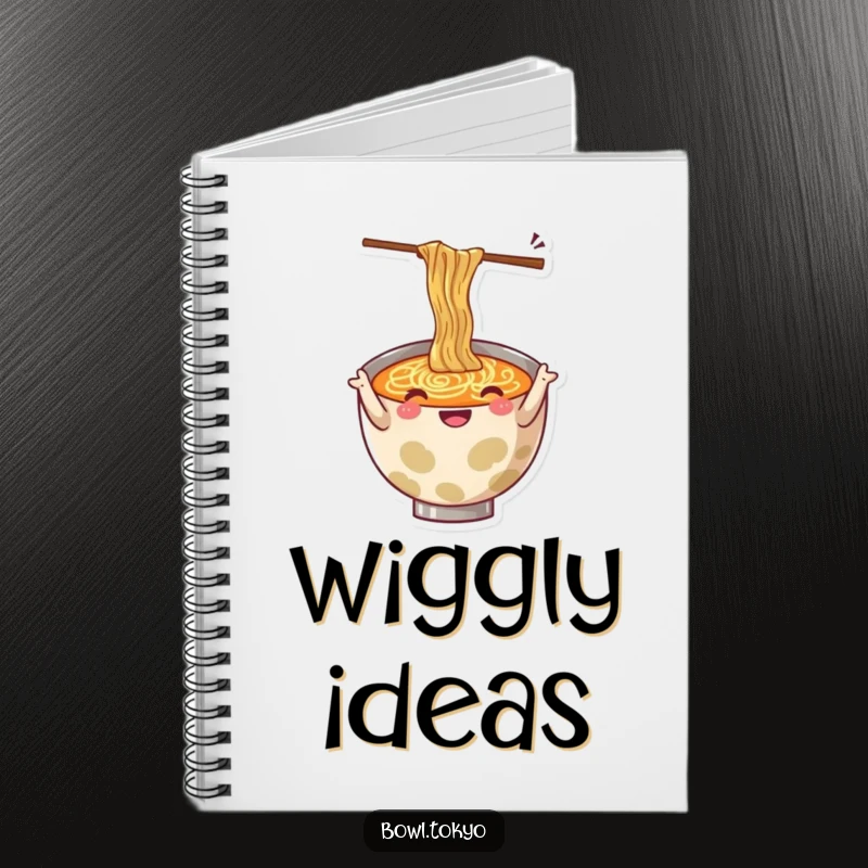 Funny notebook with a cheerful ramen bowl character gesturing with wiggling chopsticks, ideal for jotting ideas.