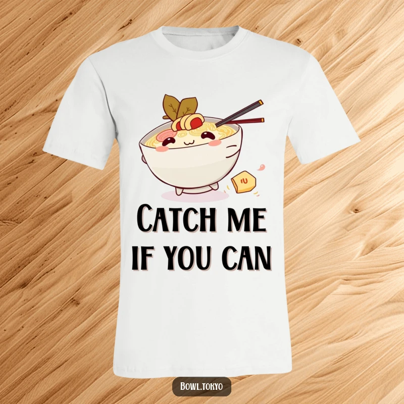 Funny Kawaii ramen bowl t-shirt, character chasing nori, playful noodle humor, foodie delight, unique gift.