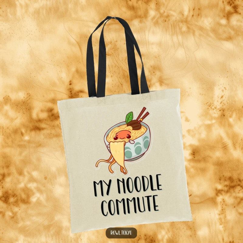 Funny tote bag showing a joyful ramen bowl character in the act of sliding down a long noodle.